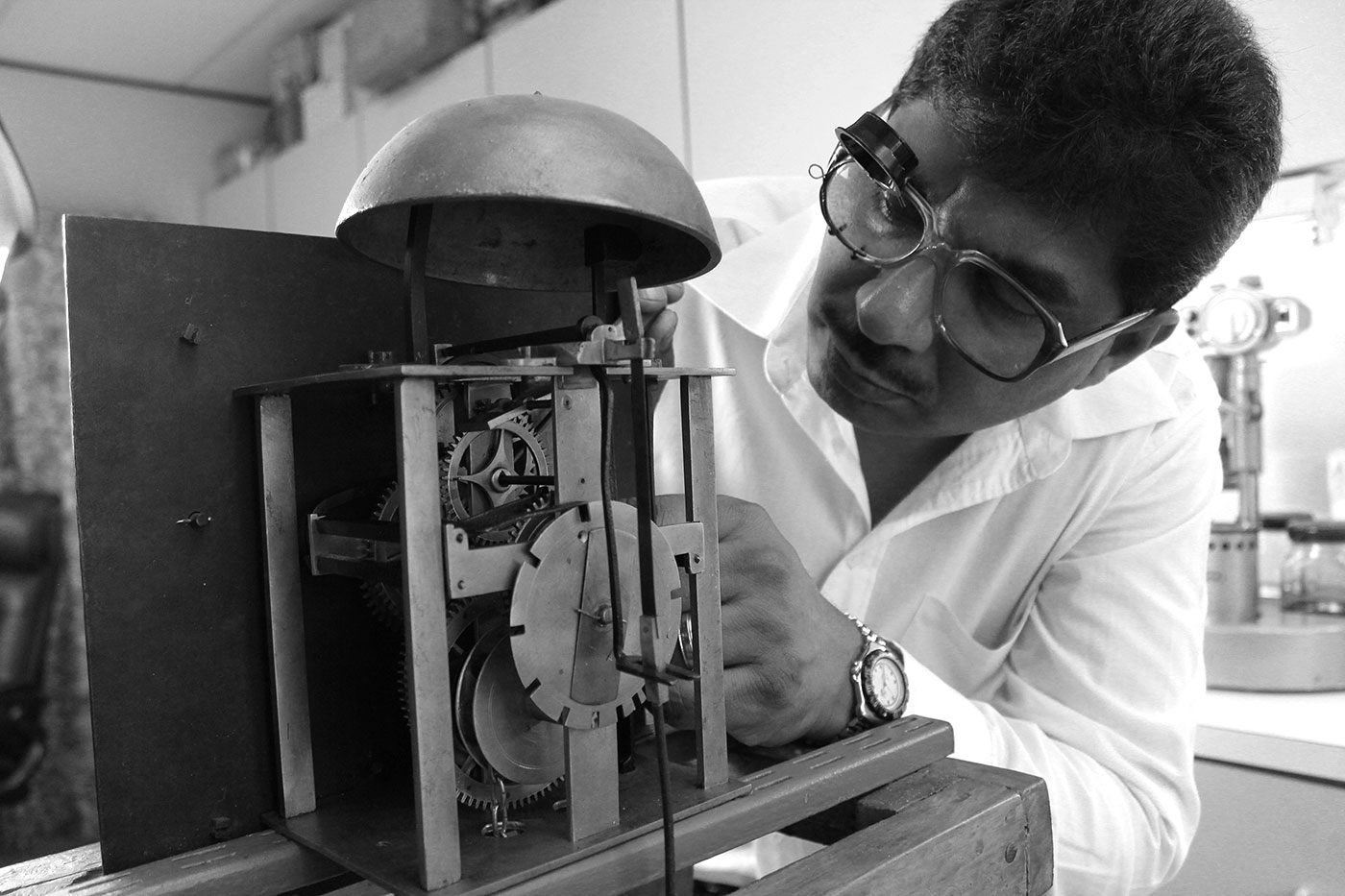 Devan Moodley working on clock